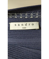 La garantie Once Again : 571900 vêtements d'occasion de marque en état irréprochable.