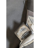 La garantie Once Again : 572202 vêtements d'occasion de marque en état irréprochable.