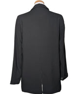 La garantie Once Again : 572297 vêtements d'occasion de marque en état irréprochable.