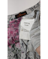 La garantie Once Again : 572354 vêtements d'occasion de marque en état irréprochable.