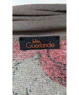 La garantie Once Again : 572360 vêtements d'occasion de marque en état irréprochable.