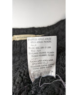 La garantie Once Again : 572484 vêtements d'occasion de marque en état irréprochable.