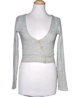 La garantie Once Again : 572579 vêtements d'occasion de marque en état irréprochable.