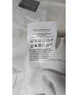 La garantie Once Again : 572842 vêtements d'occasion de marque en état irréprochable.
