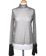 La garantie Once Again : 572855 vêtements d'occasion de marque en état irréprochable.