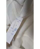 La garantie Once Again : 572938 vêtements d'occasion de marque en état irréprochable.