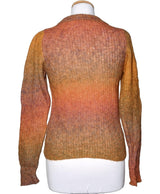 La garantie Once Again : 572939 vêtements d'occasion de marque en état irréprochable.
