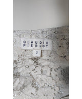 La garantie Once Again : 572949 vêtements d'occasion de marque en état irréprochable.