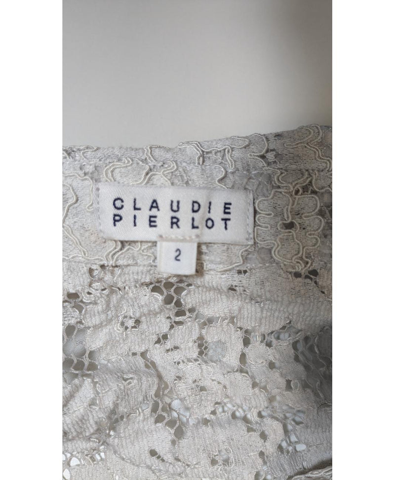 La garantie Once Again : 572949 vêtements d'occasion de marque en état irréprochable.