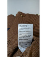 La garantie Once Again : 573120 vêtements d'occasion de marque en état irréprochable.