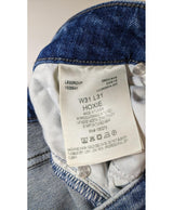 La garantie Once Again : 573165 vêtements d'occasion de marque en état irréprochable.