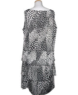 La garantie Once Again : 573213 vêtements d'occasion de marque en état irréprochable.