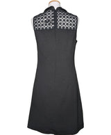 La garantie Once Again : 573248 vêtements d'occasion de marque en état irréprochable.