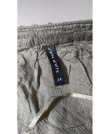 La garantie Once Again : 573287 vêtements d'occasion de marque en état irréprochable.