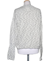 La garantie Once Again : 573301 vêtements d'occasion de marque en état irréprochable.