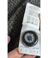 La garantie Once Again : 573496 vêtements d'occasion de marque en état irréprochable.