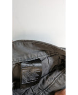 La garantie Once Again : 573509 vêtements d'occasion de marque en état irréprochable.