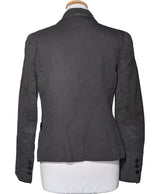 La garantie Once Again : 573538 vêtements d'occasion de marque en état irréprochable.