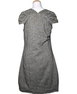 La garantie Once Again : 573543 vêtements d'occasion de marque en état irréprochable.