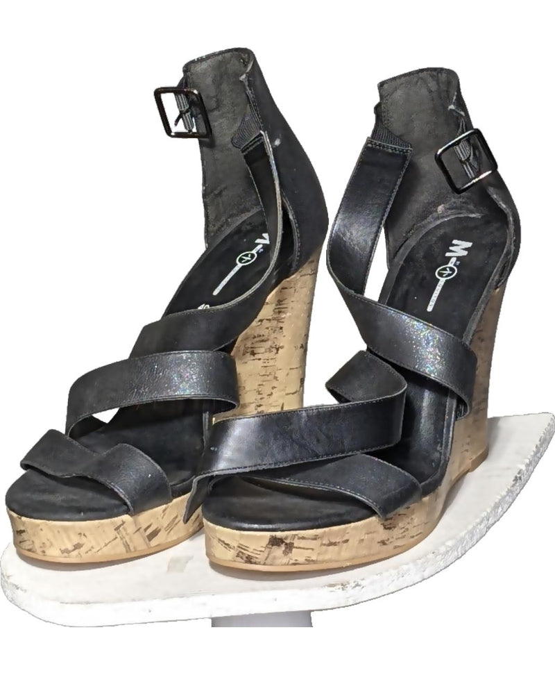 La garantie Once Again : 573587 vêtements d'occasion de marque en état irréprochable.