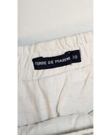 La garantie Once Again : 573591 vêtements d'occasion de marque en état irréprochable.