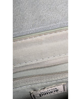Élégance responsable avec cette pièce vintage 573599 en parfait état, sélectionnée par Once Again.