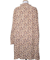 La garantie Once Again : 573649 vêtements d'occasion de marque en état irréprochable.