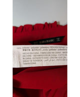La garantie Once Again : 573657 vêtements d'occasion de marque en état irréprochable.
