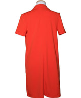 La garantie Once Again : 573675 vêtements d'occasion de marque en état irréprochable.