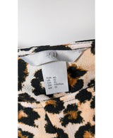La garantie Once Again : 573691 vêtements d'occasion de marque en état irréprochable.