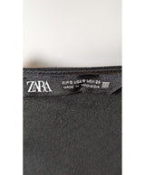 La garantie Once Again : 573701 vêtements d'occasion de marque en état irréprochable.