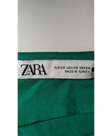 La garantie Once Again : 573717 vêtements d'occasion de marque en état irréprochable.