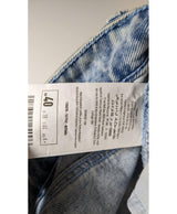 La garantie Once Again : 573840 vêtements d'occasion de marque en état irréprochable.