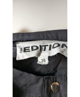 La garantie Once Again : 573852 vêtements d'occasion de marque en état irréprochable.
