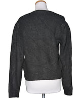 La garantie Once Again : 573882 vêtements d'occasion de marque en état irréprochable.