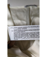 La garantie Once Again : 573890 vêtements d'occasion de marque en état irréprochable.