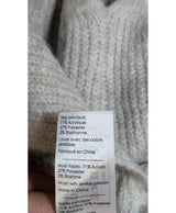 La garantie Once Again : 574196 vêtements d'occasion de marque en état irréprochable.