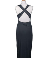La garantie Once Again : 574200 vêtements d'occasion de marque en état irréprochable.