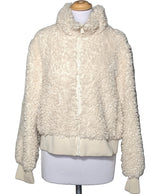 La garantie Once Again : 574207 vêtements d'occasion de marque en état irréprochable.