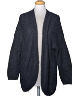 La garantie Once Again : 574263 vêtements d'occasion de marque en état irréprochable.