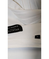 La garantie Once Again : 574292 vêtements d'occasion de marque en état irréprochable.