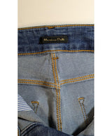 La garantie Once Again : 574388 vêtements d'occasion de marque en état irréprochable.