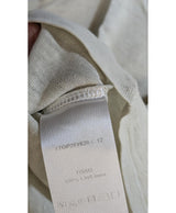 La garantie Once Again : 574417 vêtements d'occasion de marque en état irréprochable.