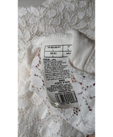 La garantie Once Again : 574479 vêtements d'occasion de marque en état irréprochable.