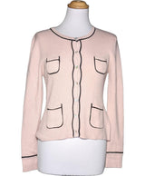 La garantie Once Again : 574540 vêtements d'occasion de marque en état irréprochable.