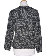 La garantie Once Again : 574560 vêtements d'occasion de marque en état irréprochable.