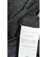 La garantie Once Again : 574896 vêtements d'occasion de marque en état irréprochable.