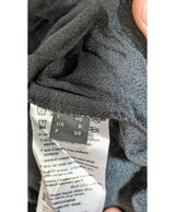 La garantie Once Again : 574933 vêtements d'occasion de marque en état irréprochable.