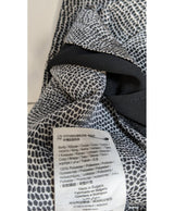 La garantie Once Again : 574956 vêtements d'occasion de marque en état irréprochable.