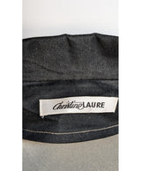 La garantie Once Again : 574989 vêtements d'occasion de marque en état irréprochable.